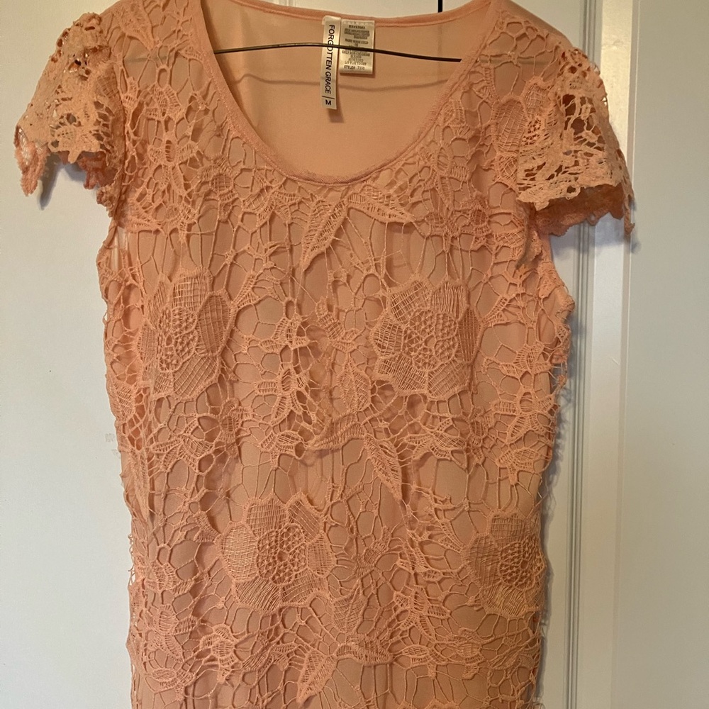 Ladies peach color lace trimmed shirt